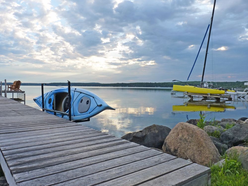 A kayak on Torch Lake's dock