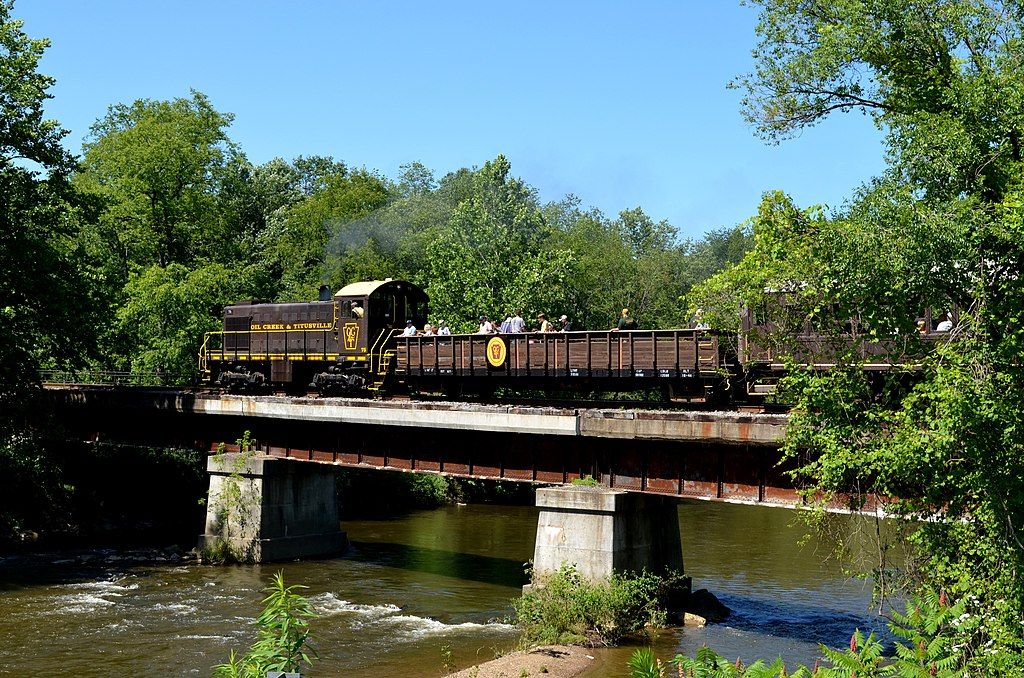 A Oil Creek and Titusville Railroad train crossing a bridge