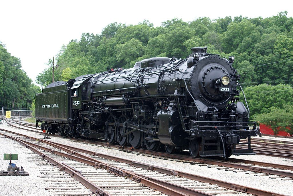 A black coloured train called "New York Central".