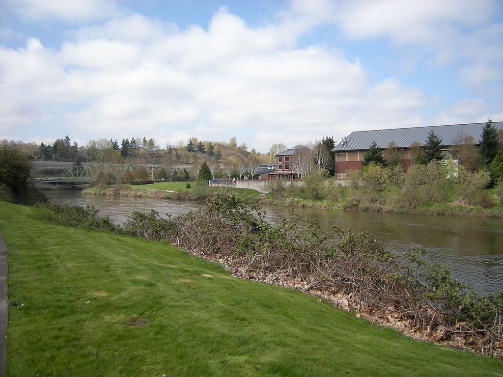 Green grass and trees around Tukwila Community Center.