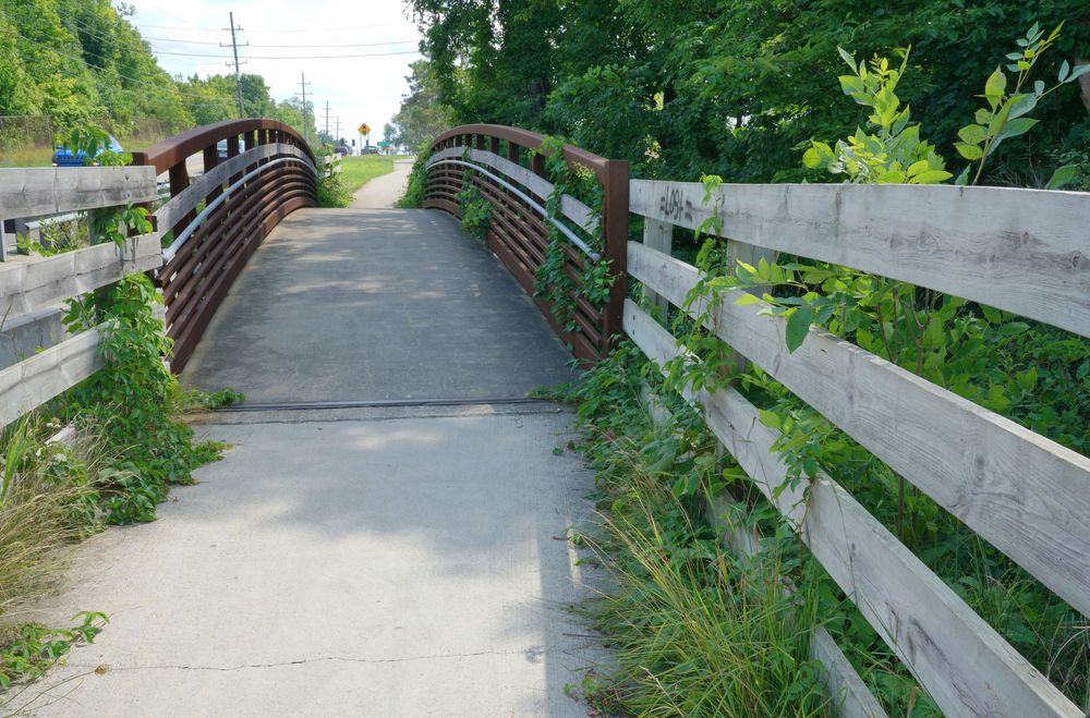An arched pathway at River Bends Park