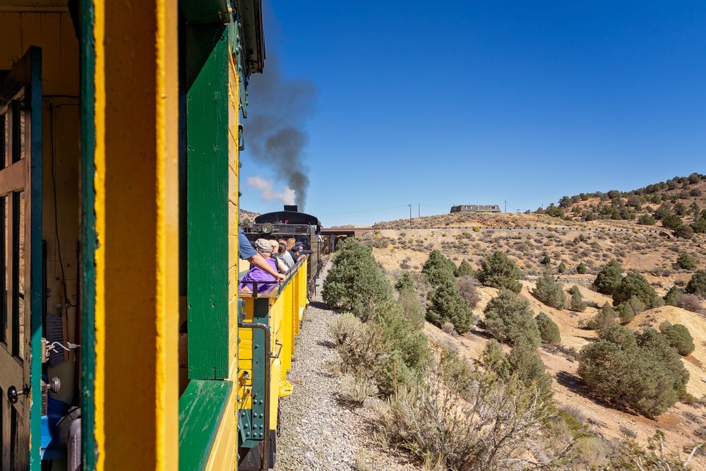 People aboard the train of Virginia and Truckee Railroad
