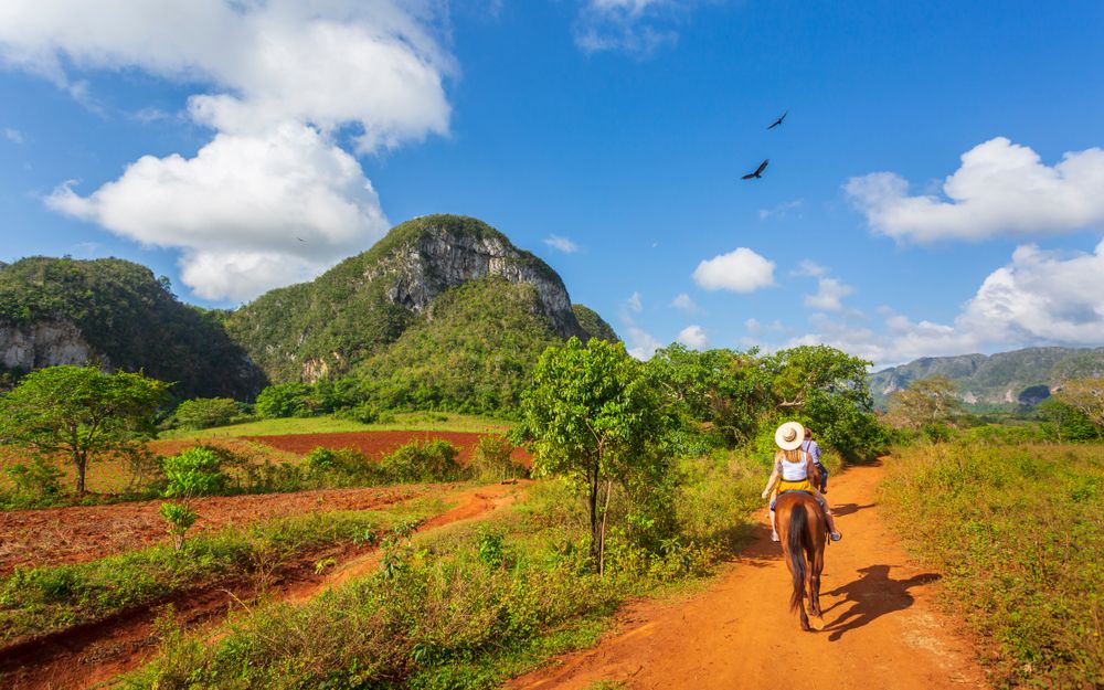 A person on a Horseback Riding Tour around scenic Vinales