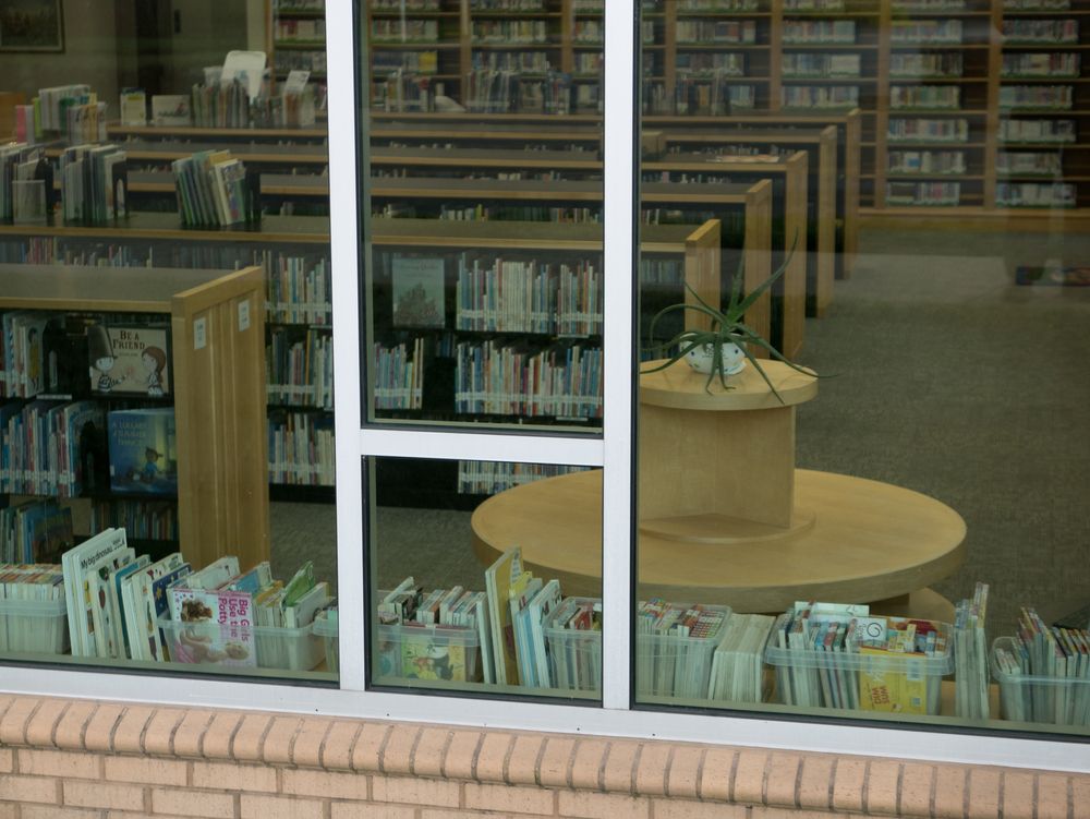 Looking through the window of Johnson City Public Library