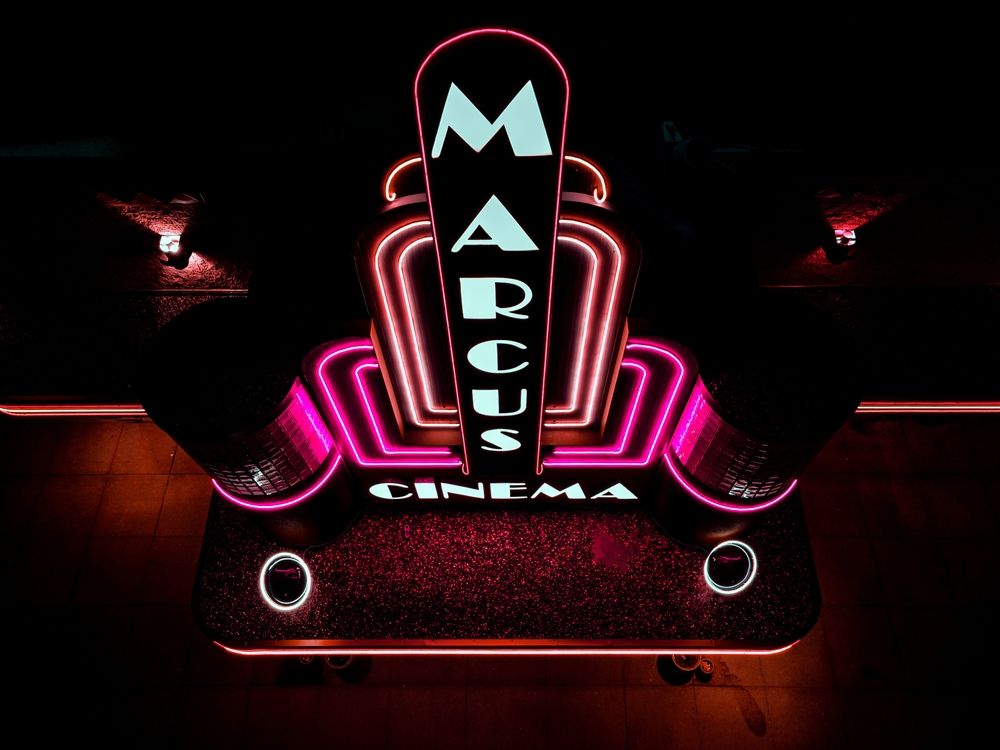 Neon sign of Marcus Oakdale Cinema