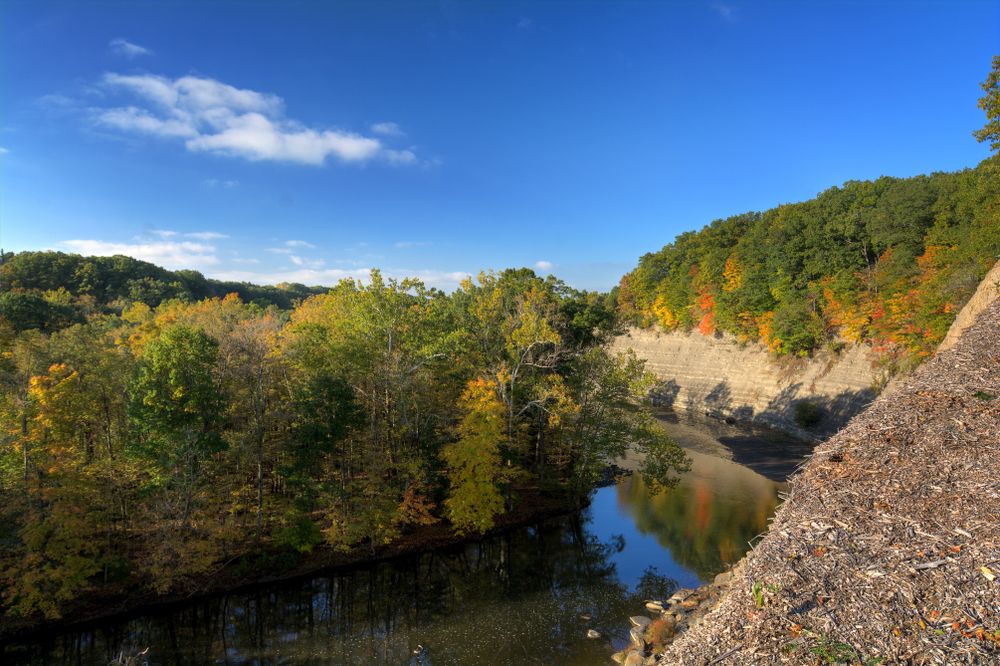 The waters of Rocky River Reservation surrounded by trees