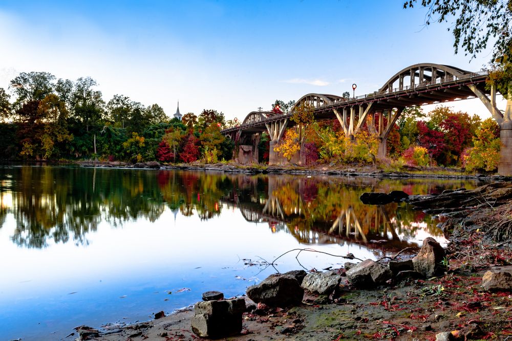 Bibb Graves Bridge reflecting on a lake