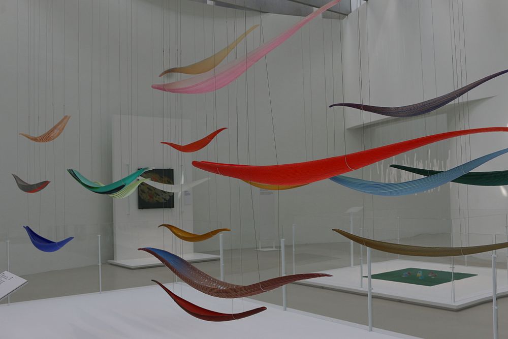Colorful hanging glass figures in Corning Museum of Glass