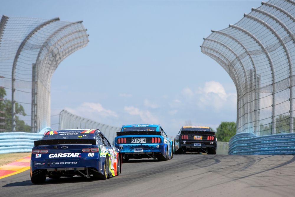 Race cars rear at Watkins Glen International