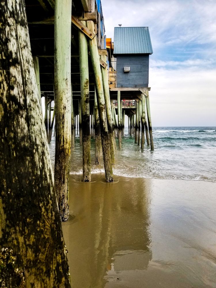 Waters under the pier of Old Orchard Beach