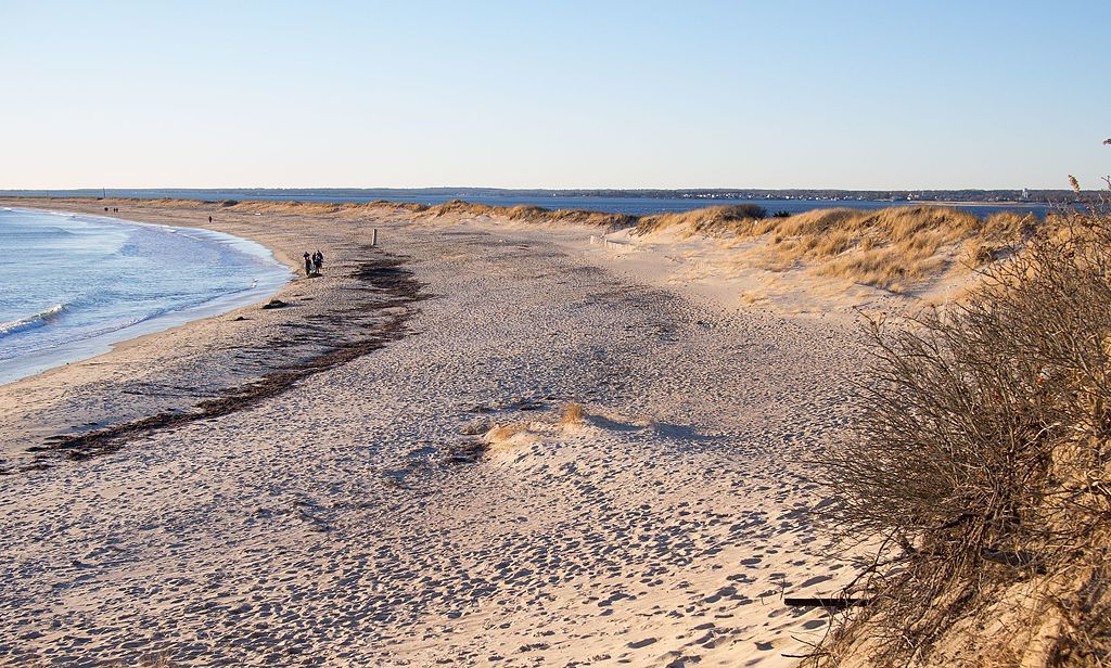 People walking along Napatree Point Conservation Area