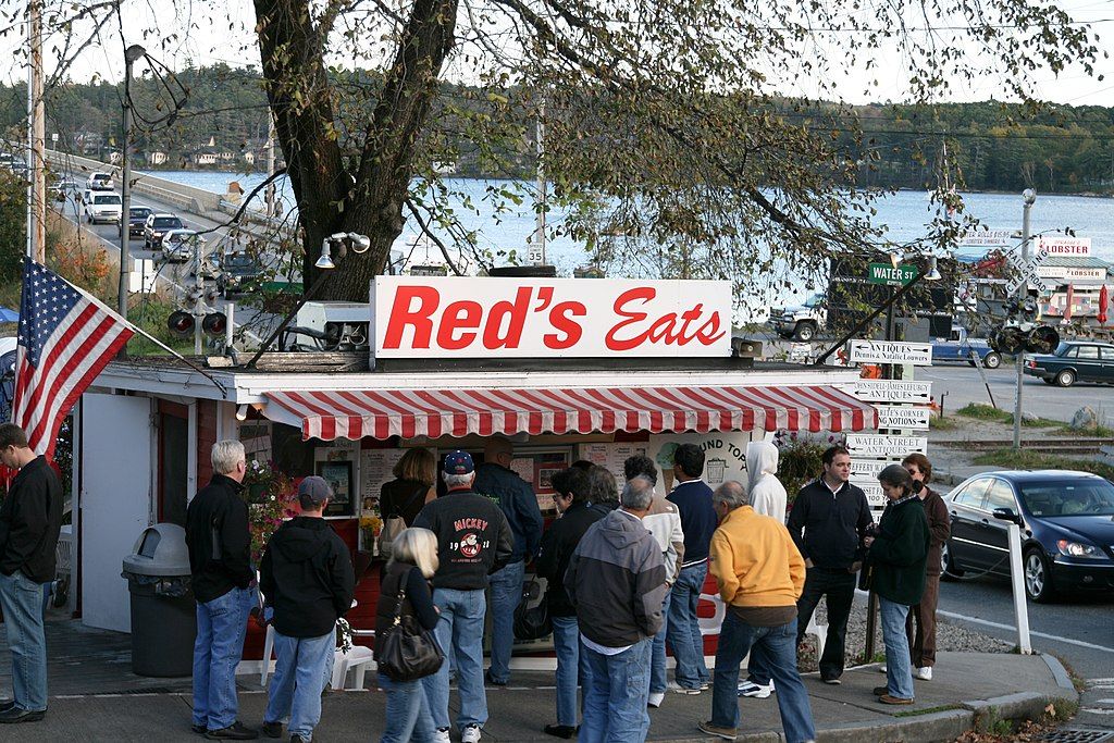 People waiting in line in front of Red's eats.