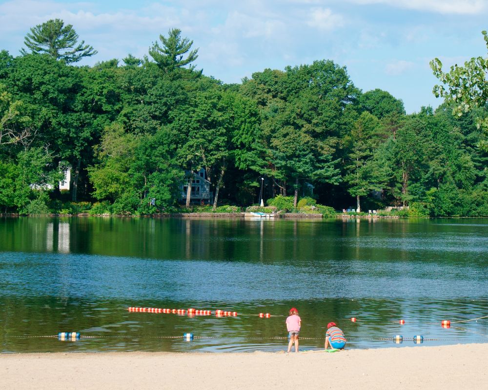 Two kids playing at Morses Pond Beach