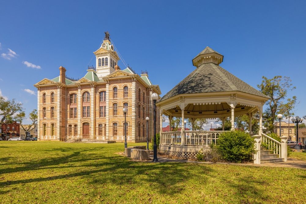A gazebo beside the Historic Wharton County Courthouse