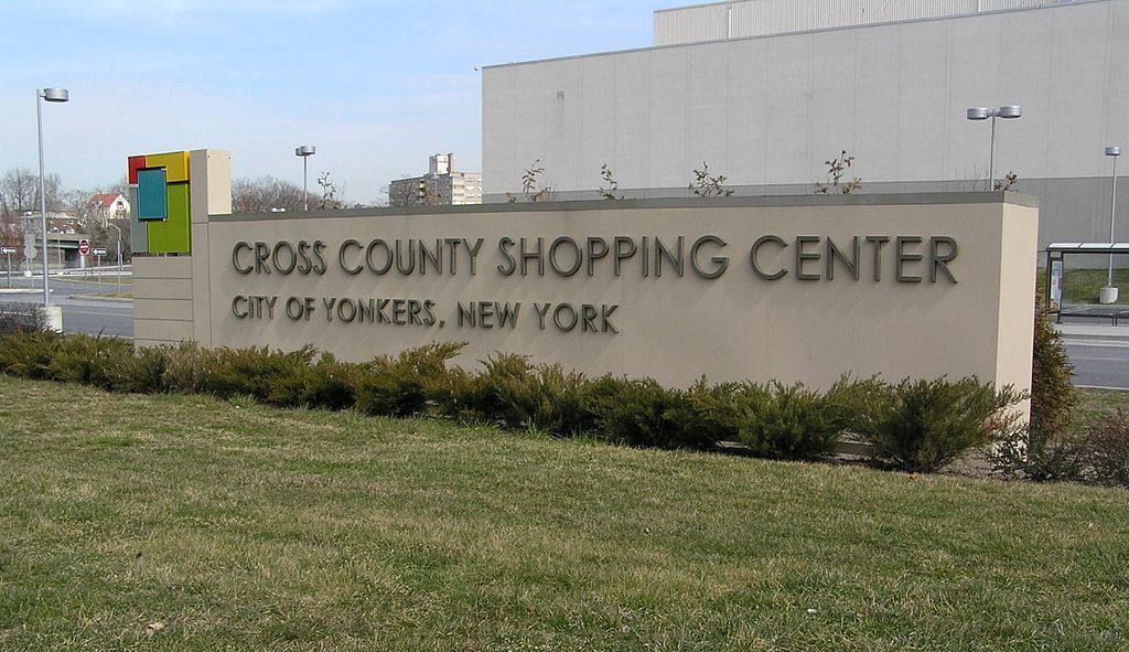Welcome sign of Cross County Shopping Center