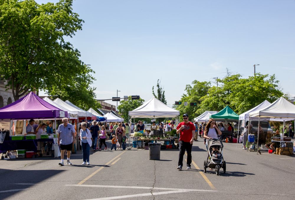 Vendors and shoppers at Downtown Yakima Farmers Market