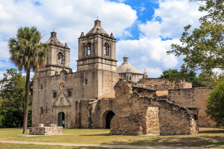 The historic Mission Concepcion stands as a testament to San Antonio’s rich cultural heritage, its weathered stone walls basking under the Texas sky.