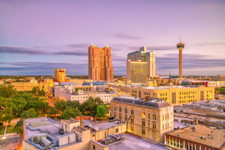 The vibrant hues of dusk accentuate the Downtown San Antonio skyline, showcasing the city’s dynamic architecture and urban charm.