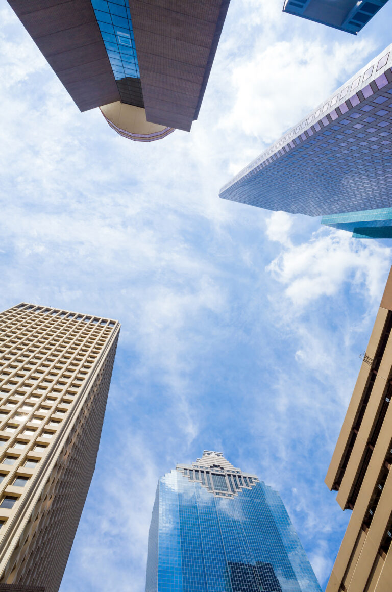Towering skyscrapers reach for the sky, showcasing the architectural grandeur of downtown Houston, Texas.
